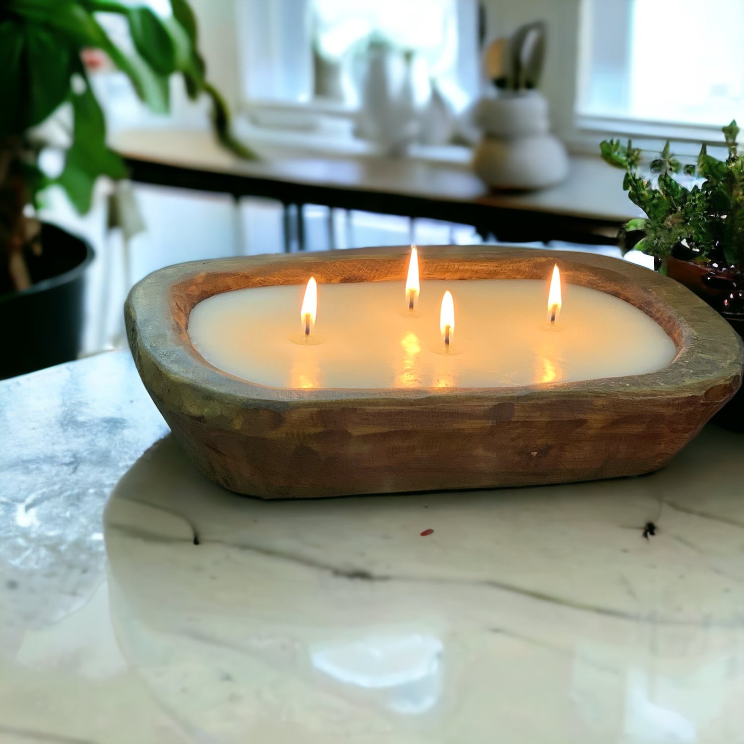 Baguette candle lit, on a counter top.