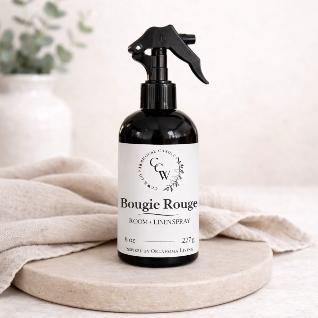 Bougie Rouge room and linen spray from CCW & Co Farmhouse Candles, styled with soft linens as part of the Linen Revival collection