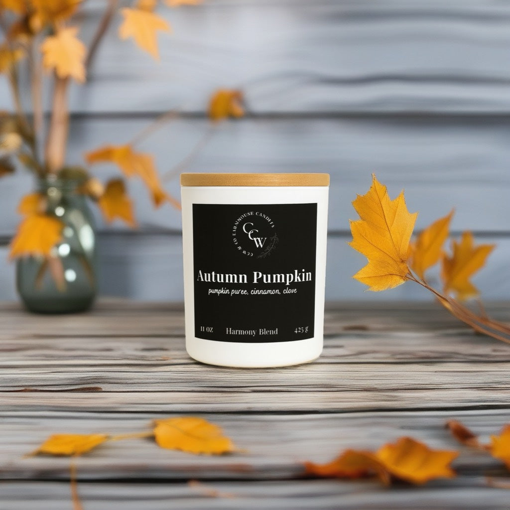 Autumn Pumpkin candle by CCW & Co farmhouse candles, white cottage jar with wood lid, a classic fall blend of pumpkin purée, cinnamon, and clove that fills your home with cozy, harvest-season warmth