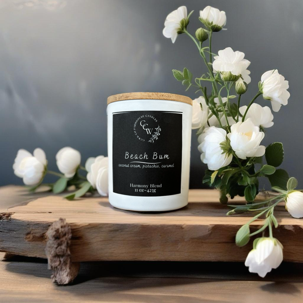 Beach Bum candle by CCW & Co farmhouse candles, white cottage jar with wood lid, a creamy tropical blend of coconut, pistachio, and caramel that captures the carefree warmth of sunny beach days.