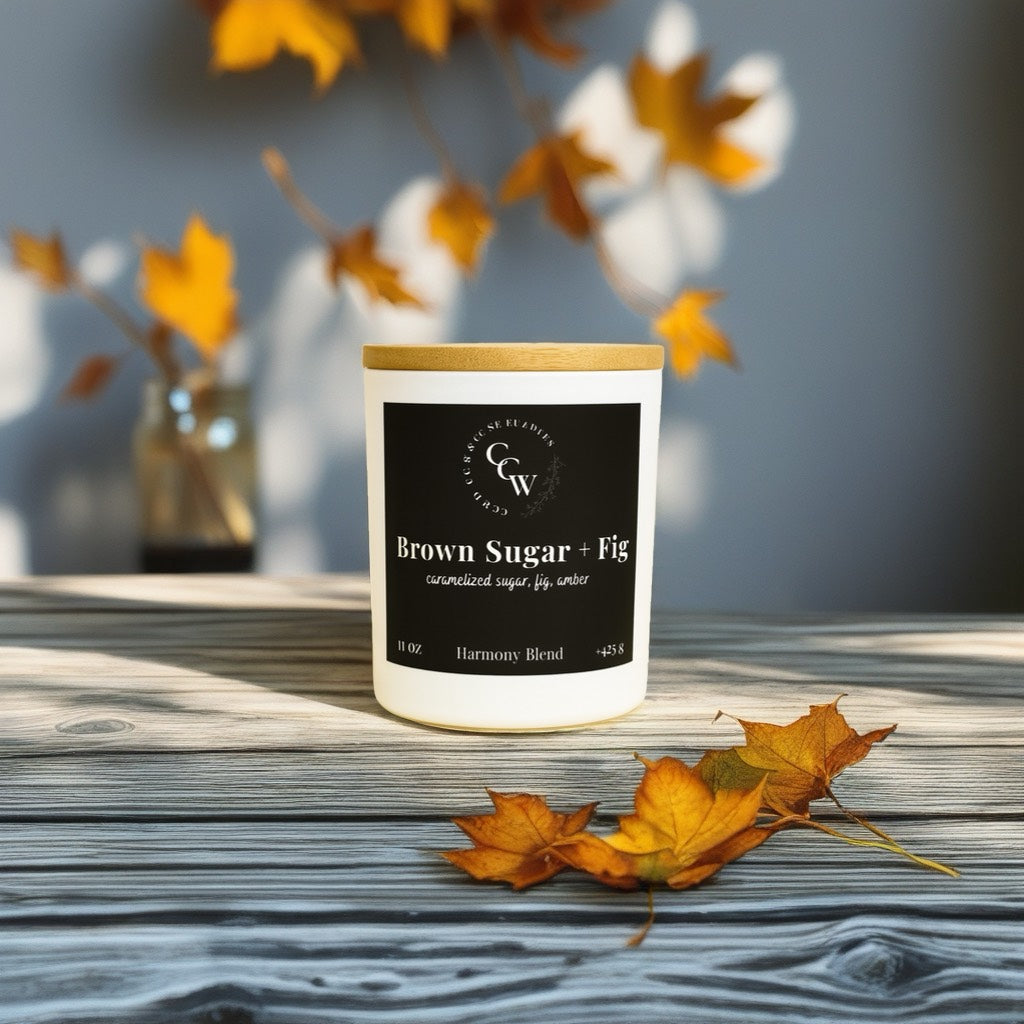 Brown Sugar + Fig candle by CCW & Co farmhouse candles, white cottage jar with wood lid, a warm and inviting blend of caramelized sugar, ripe fig, and golden amber that fills your home with cozy elegance.