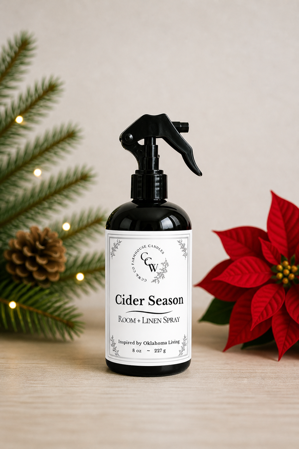 Cider Season room + linen spray in black bottle with Christmas greenery and poinsettia – CCW Farmhouse home fragrance