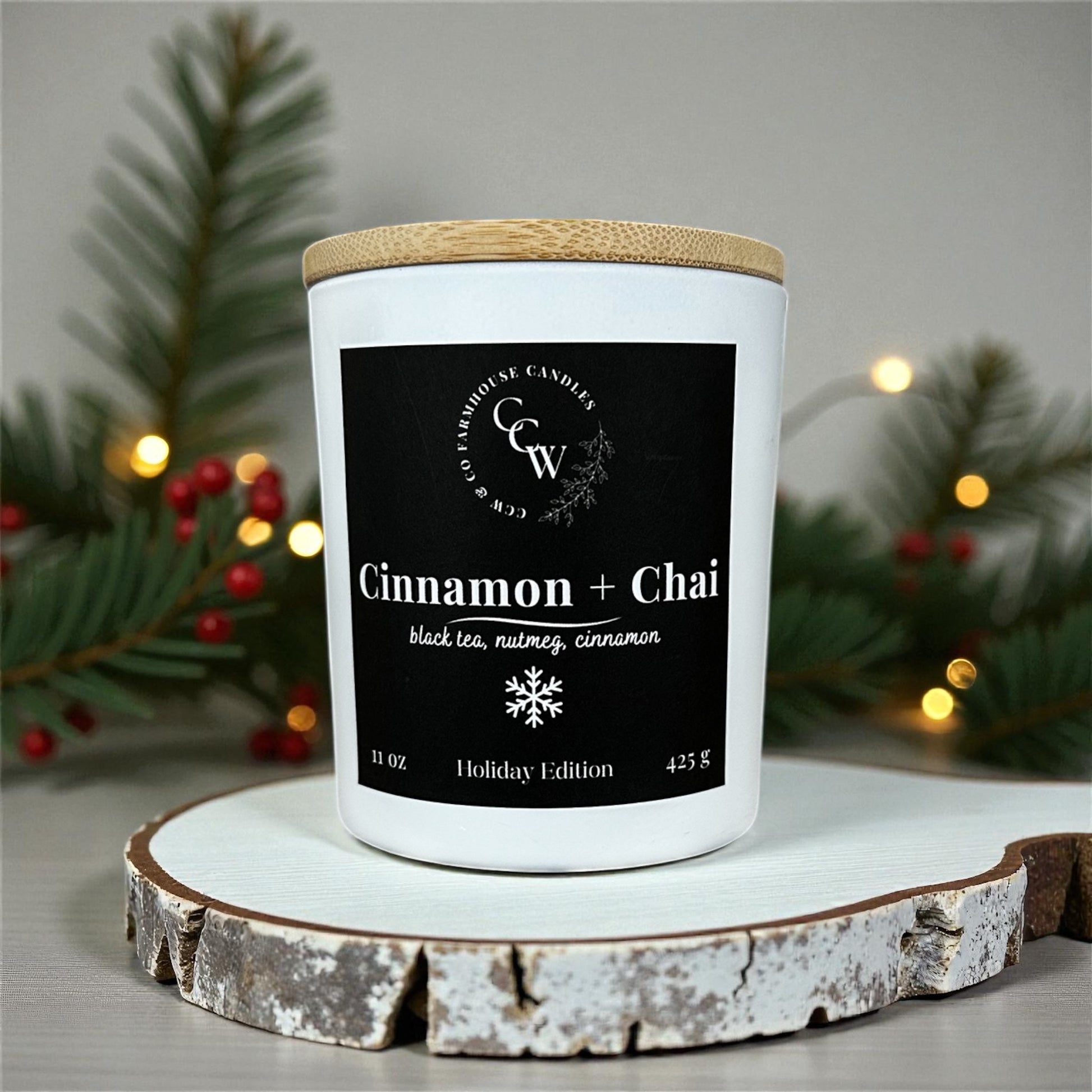 Cinnamon + Chai candle by CCW & Co farmhouse candles, white cottage jar with wood lid, holiday scent of black tea, nutmeg, and cinnamon.