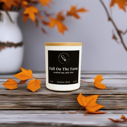 Fall On The Farm candle by CCW & Co farmhouse candles, white cottage jar with wood lid, a refreshing blend of woodland sage, crisp apple, and bright citrus that captures the simple beauty of autumn days on the farm.