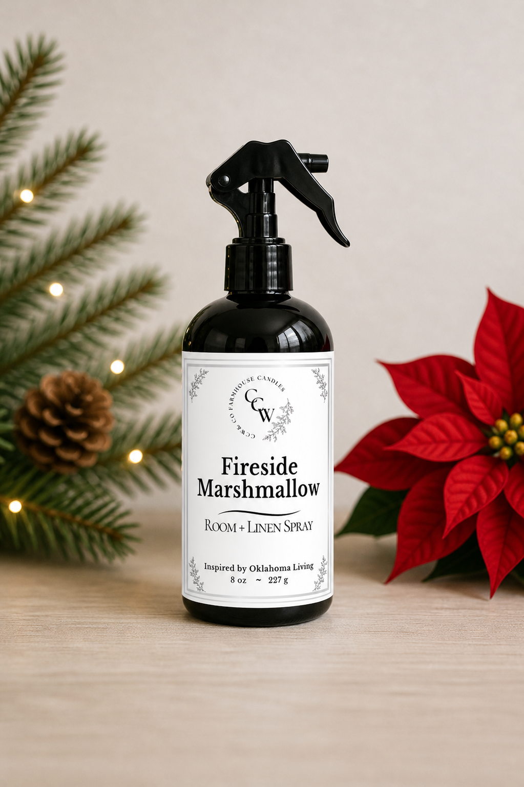 Fireside Marshmallow room + linen spray in black bottle with Christmas greenery and poinsettia – CCW Farmhouse home fragrance