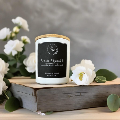 Fresh Figue 15 candle by CCW & Co farmhouse candles, white cottage jar with wood lid, a sophisticated blend of mission fig, golden apple, and soft musk that evokes modern elegance with a hint of sweetness.