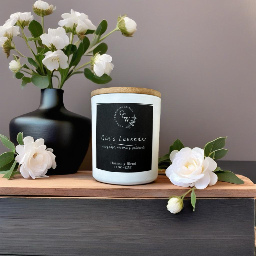 Gin’s Lavender candle by CCW & Co farmhouse candles, white cottage jar with wood lid, a calming blend of clary sage, rosemary, and lavender patchouli that evokes the soothing scent of a countryside garden in bloom.