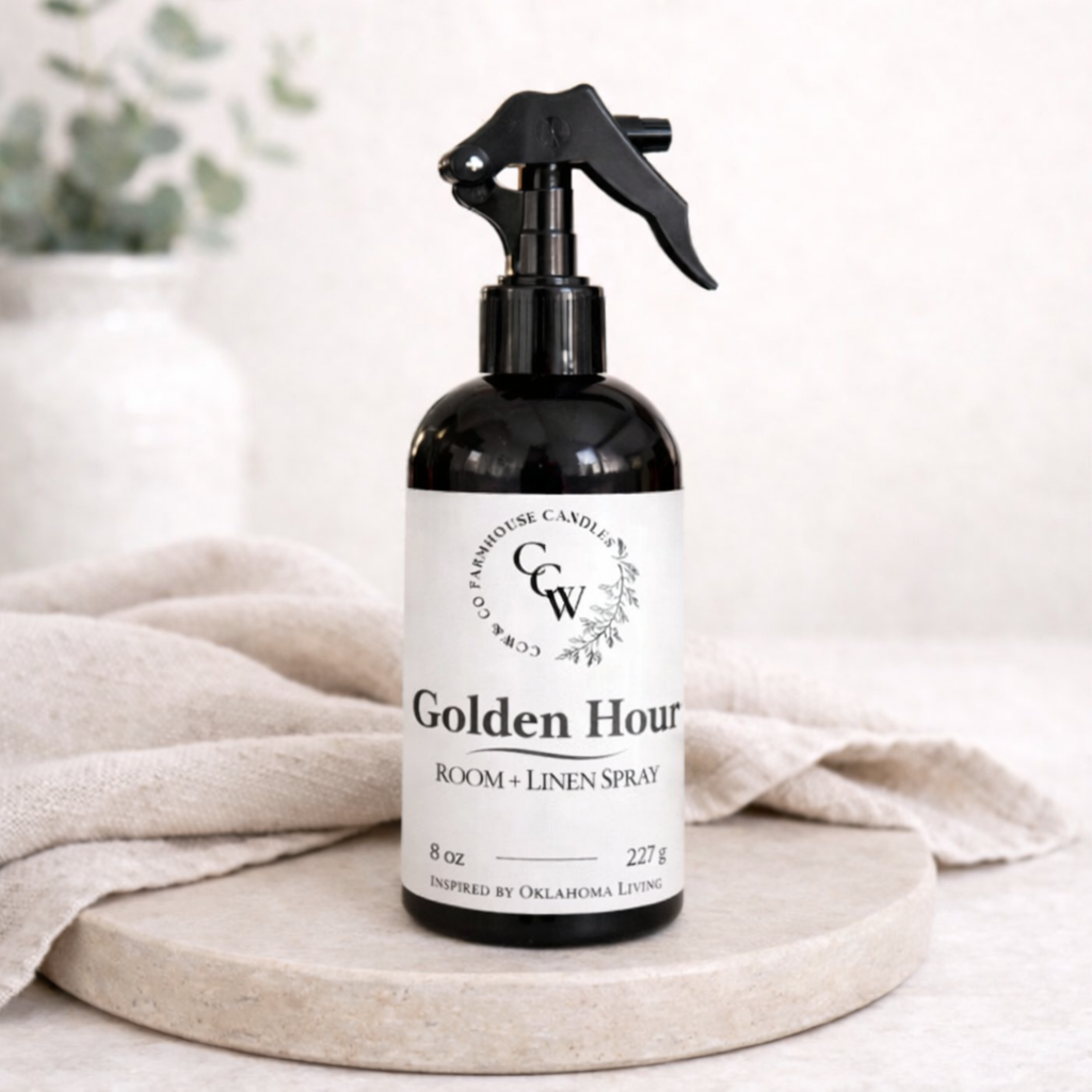 Room spray bottle labeled 'Golden Hour' on a neutral background