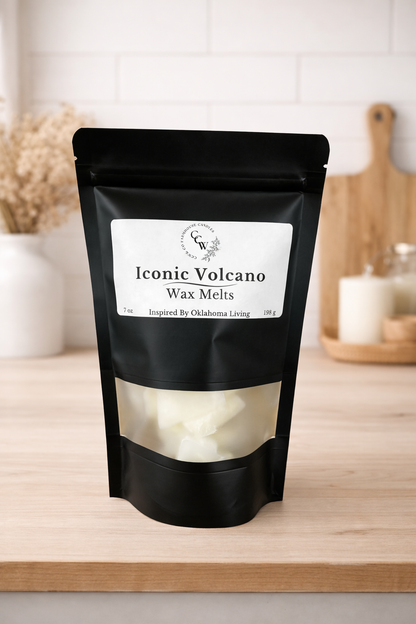 Black resealable pouch of Iconic Volcano wax melts by CCW & Co Farmhouse Candles, featuring a white label and clear window showing hand-poured wax melts, styled on a neutral kitchen countertop.