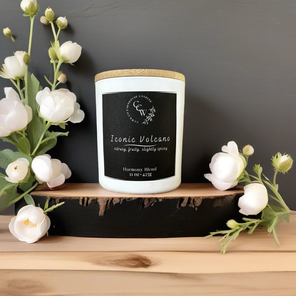 Iconic Volcano candle by CCW & Co farmhouse candles, white cottage jar with wood lid, a vibrant blend of citrus, tropical fruit, and a hint of spice that fills your home with energizing island warmth.