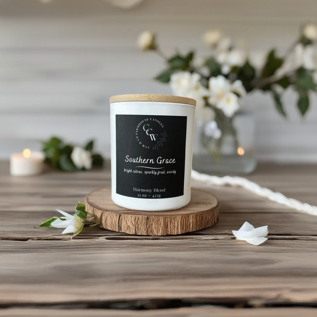 Southern Grace candle by CCW & Co farmhouse candles, white cottage jar with wood lid, a graceful blend of bright citrus, sparkling fruit, and soft woody notes that embody Southern charm and warmth.