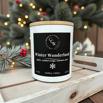 Winter Wonderland candle by CCW & Co farmhouse candles, white cottage jar with wood lid, holiday scent of apples, candied orange, and cinnamon spice.