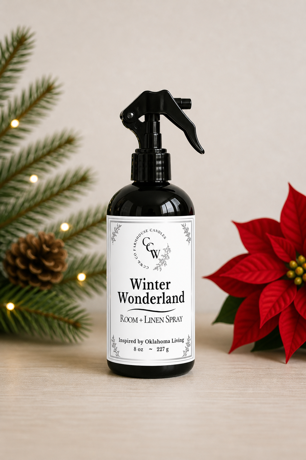 Winter Wonderland room + linen spray in black bottle with Christmas greenery and poinsettia – CCW Farmhouse home fragrance