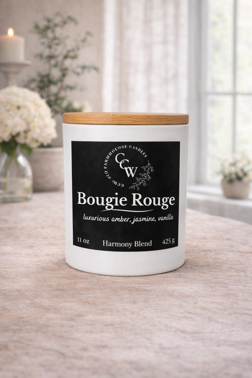 Bougie Rouge candle by CCW & Co Farmhouse Candles in a white jar with wooden lid, styled on a neutral tabletop in soft natural light