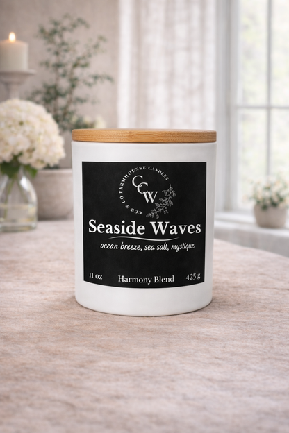 Seaside Waves candle by CCW & Co Farmhouse Candles in a white jar with wooden lid, styled on a neutral tabletop in a bright, airy setting