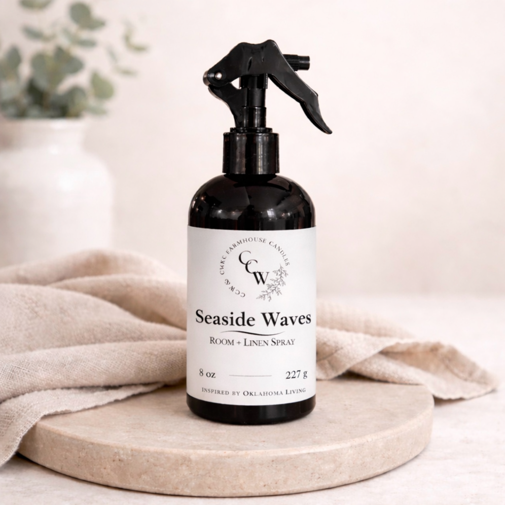 Seaside Waves room and linen spray by CCW & Co Farmhouse Candles, photographed on a neutral stone tray for the Linen Revival collection