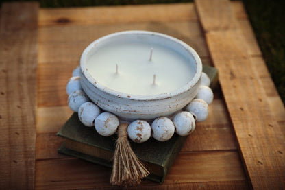 white beaded bowl candle
