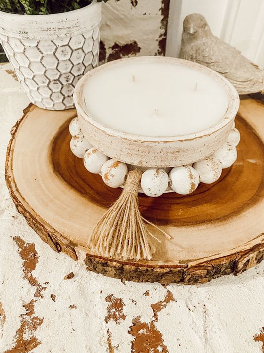 white beaded bowl candle
